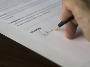 photo of a document being signed