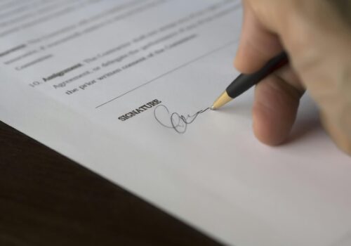 photo of a document being signed